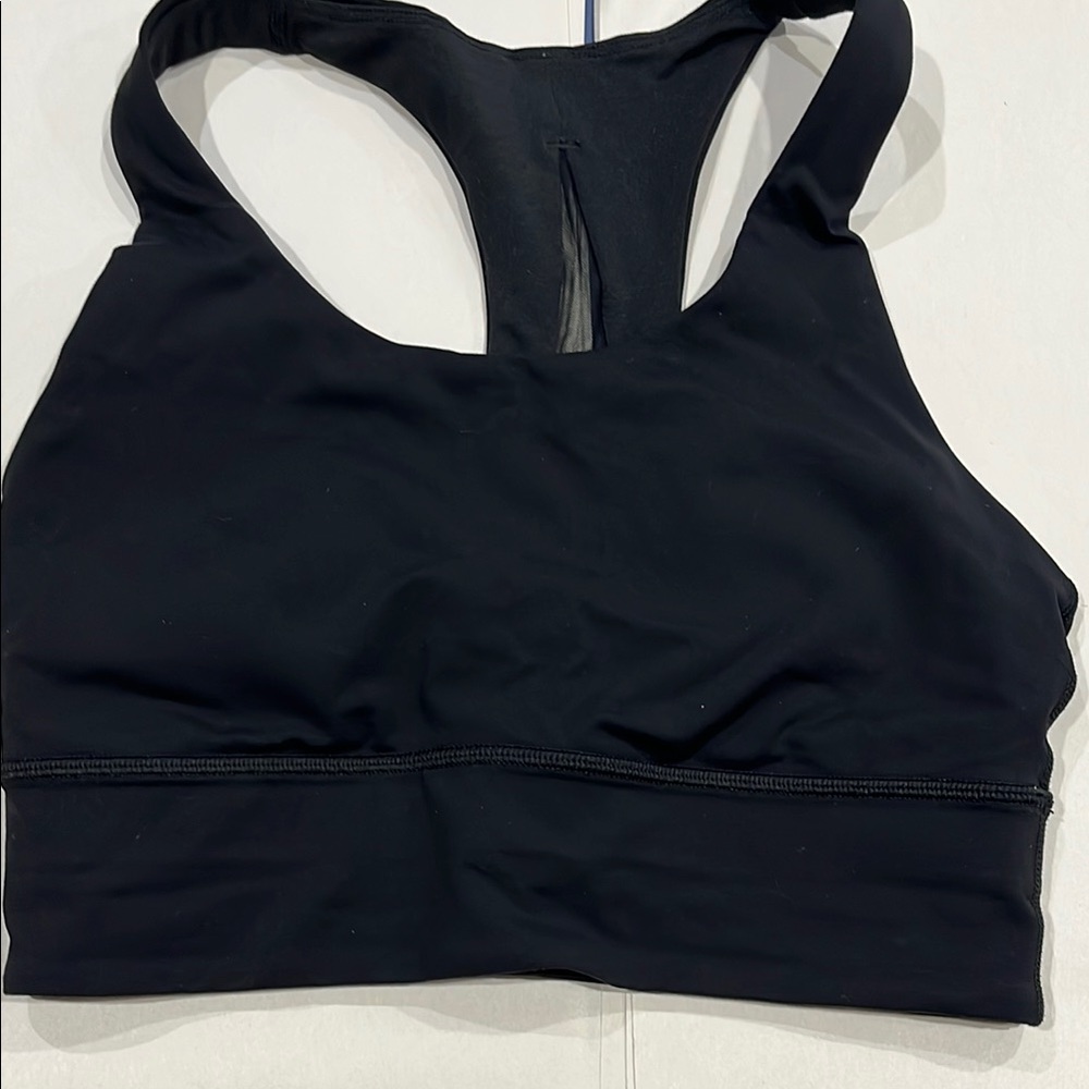 Lululemon Black Sports Bra with Racerback Design and Stretchy Fabric
Size 6